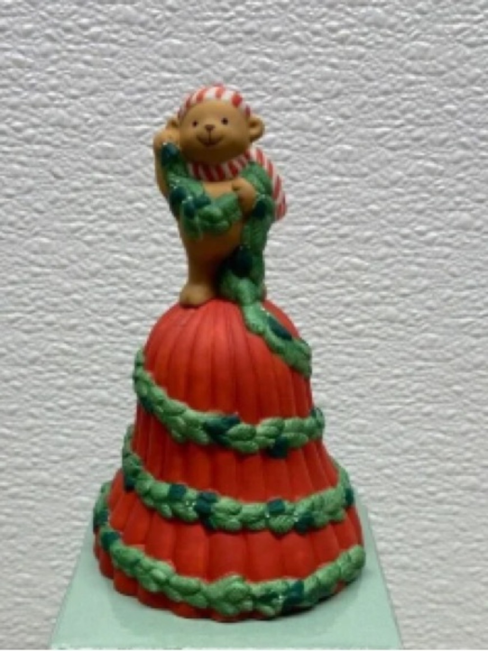Red Holiday Bell Figurine with Green Garland and Bear Accent